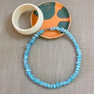 Blue puka necklace with white wood bangle